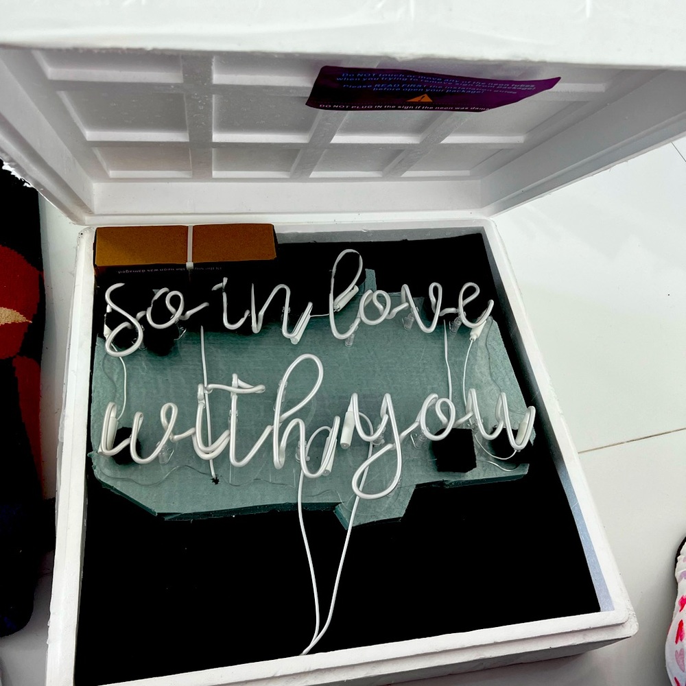 Neon sign “so in love with you” brand new. In clear acrilic back